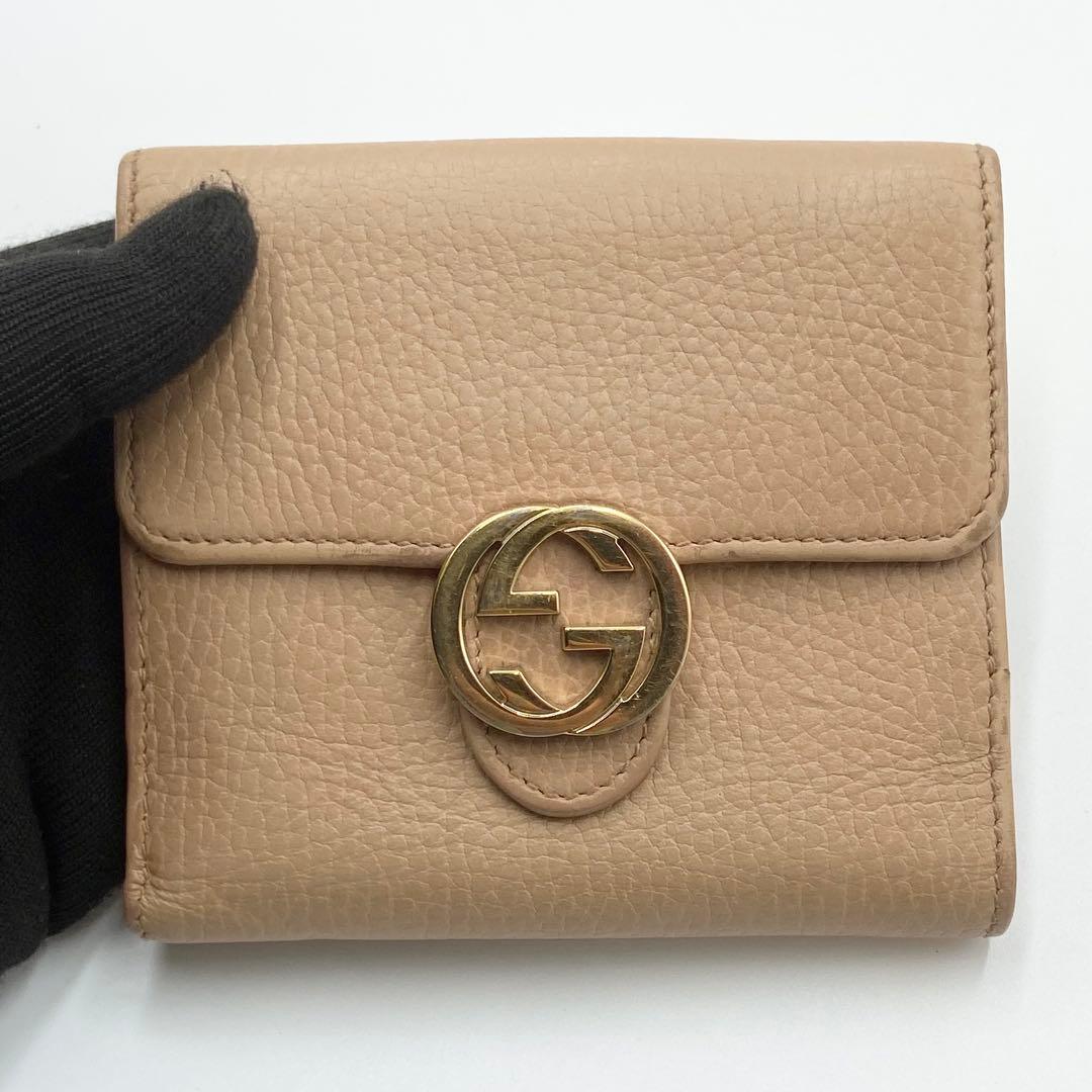 GUCCI インターロッキングG ダラーカーフ 二つ折り財布 ゴールド　ベージュ