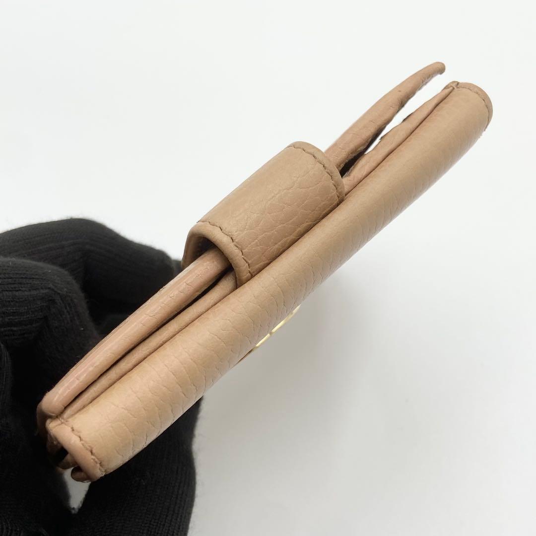 GUCCI インターロッキングG ダラーカーフ 二つ折り財布 ゴールド　ベージュ