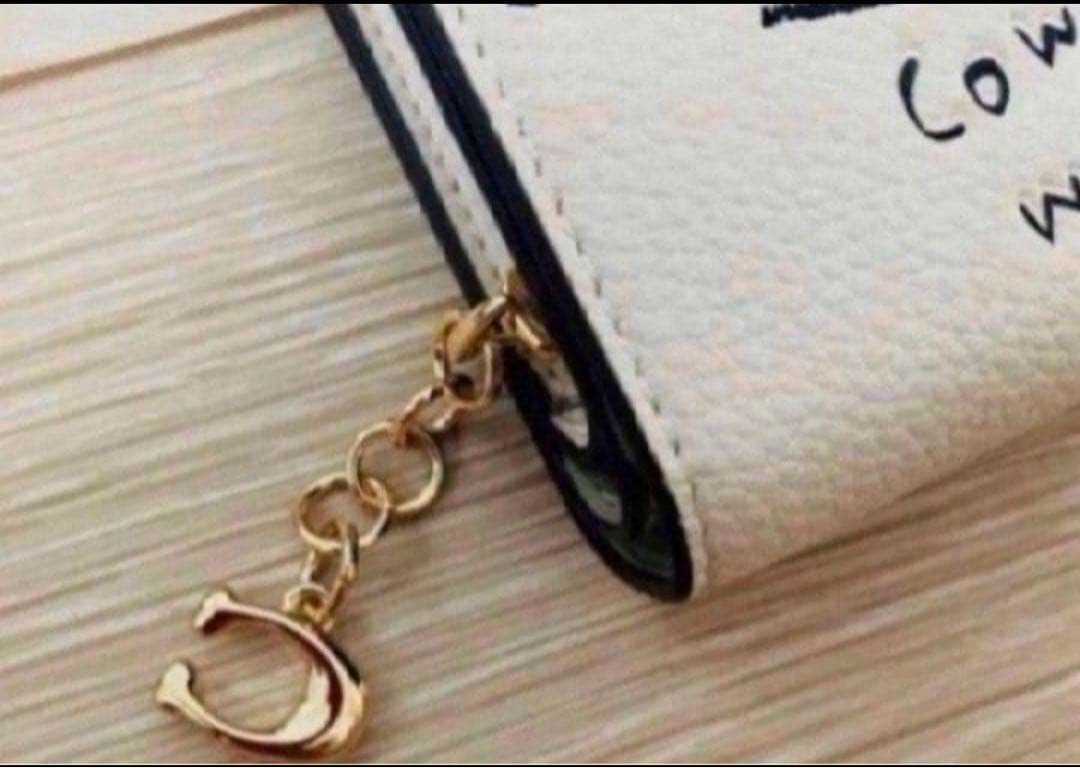 新品コーチCOACHパスキアコラボ二つ折り財布スナップウォレットホワイト.白