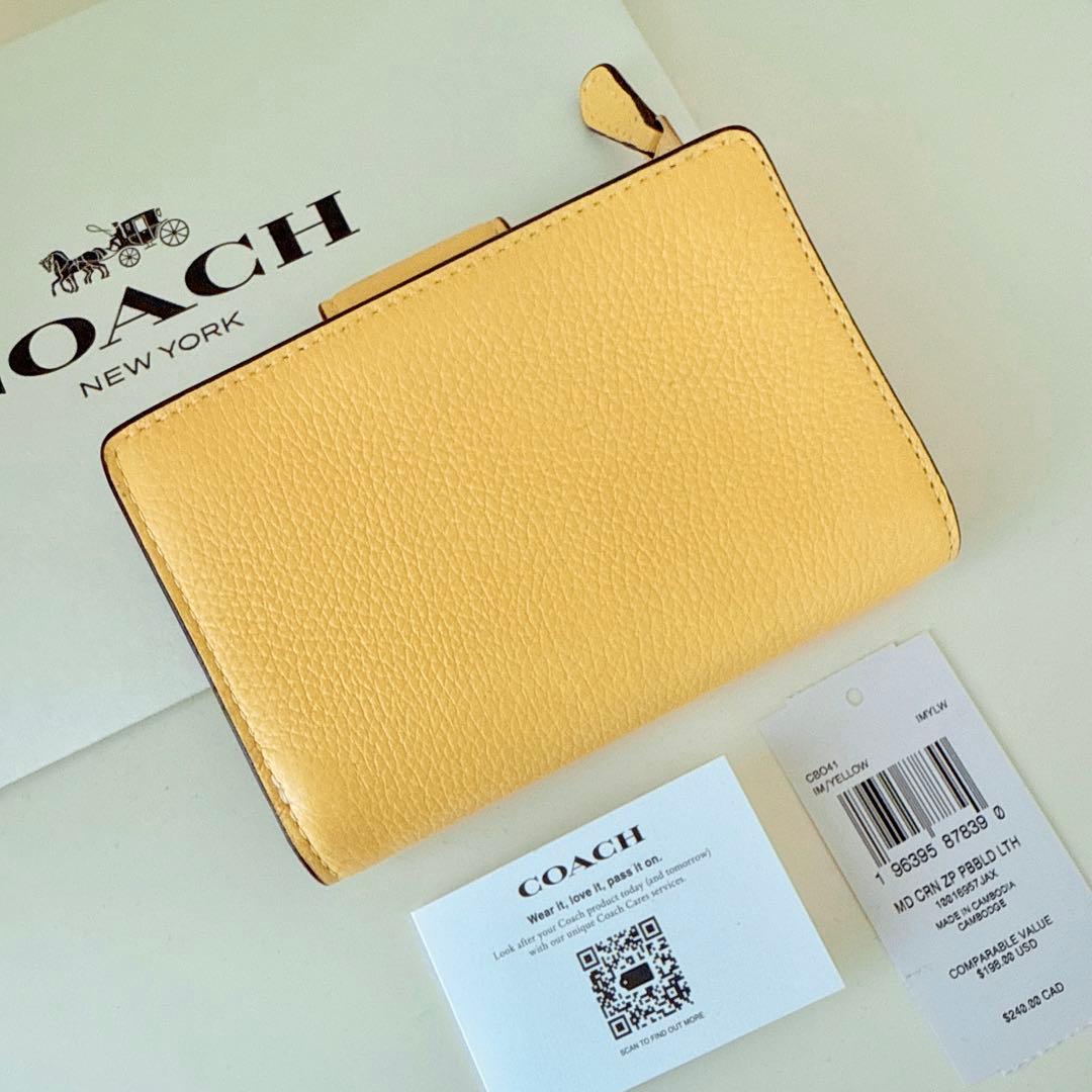 COACH コーチ　折り財布　イエロー　黄色　二つ折り財布