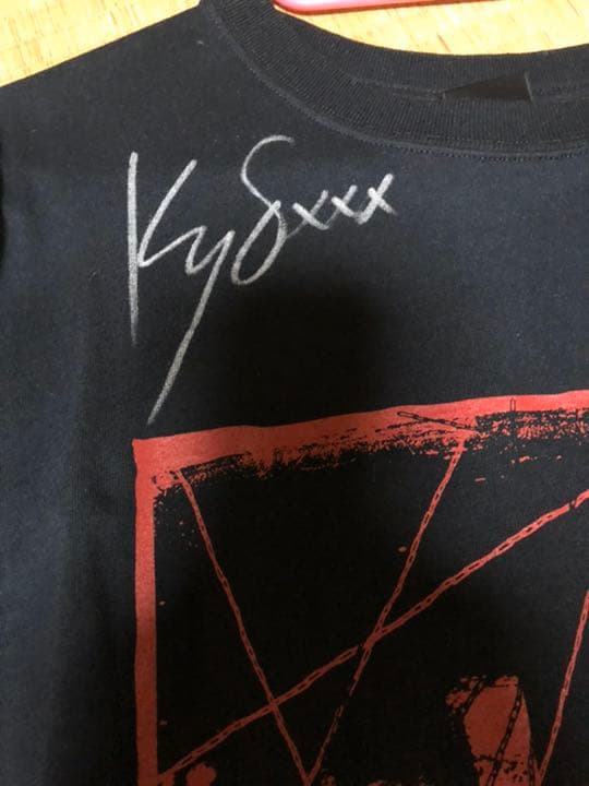 デランジェ サイン入りTシャツ