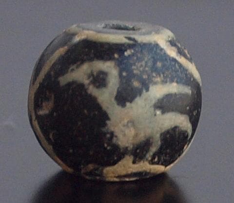 ジャワ発掘、珍しい横向き鳥マニック・ブルン　黒の胎に白で鳥・放射・Ｘ・環モチーフ