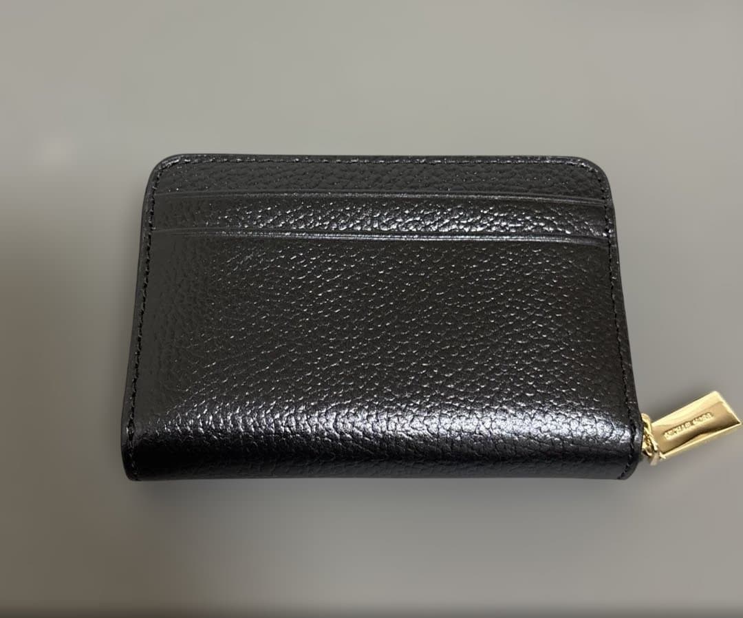 新品　マイケルマイケルコース JET SET CHARM ケース