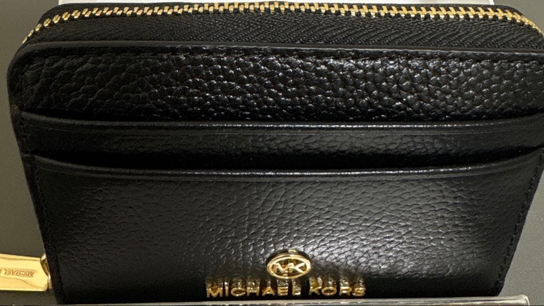 新品　マイケルマイケルコース JET SET CHARM ケース