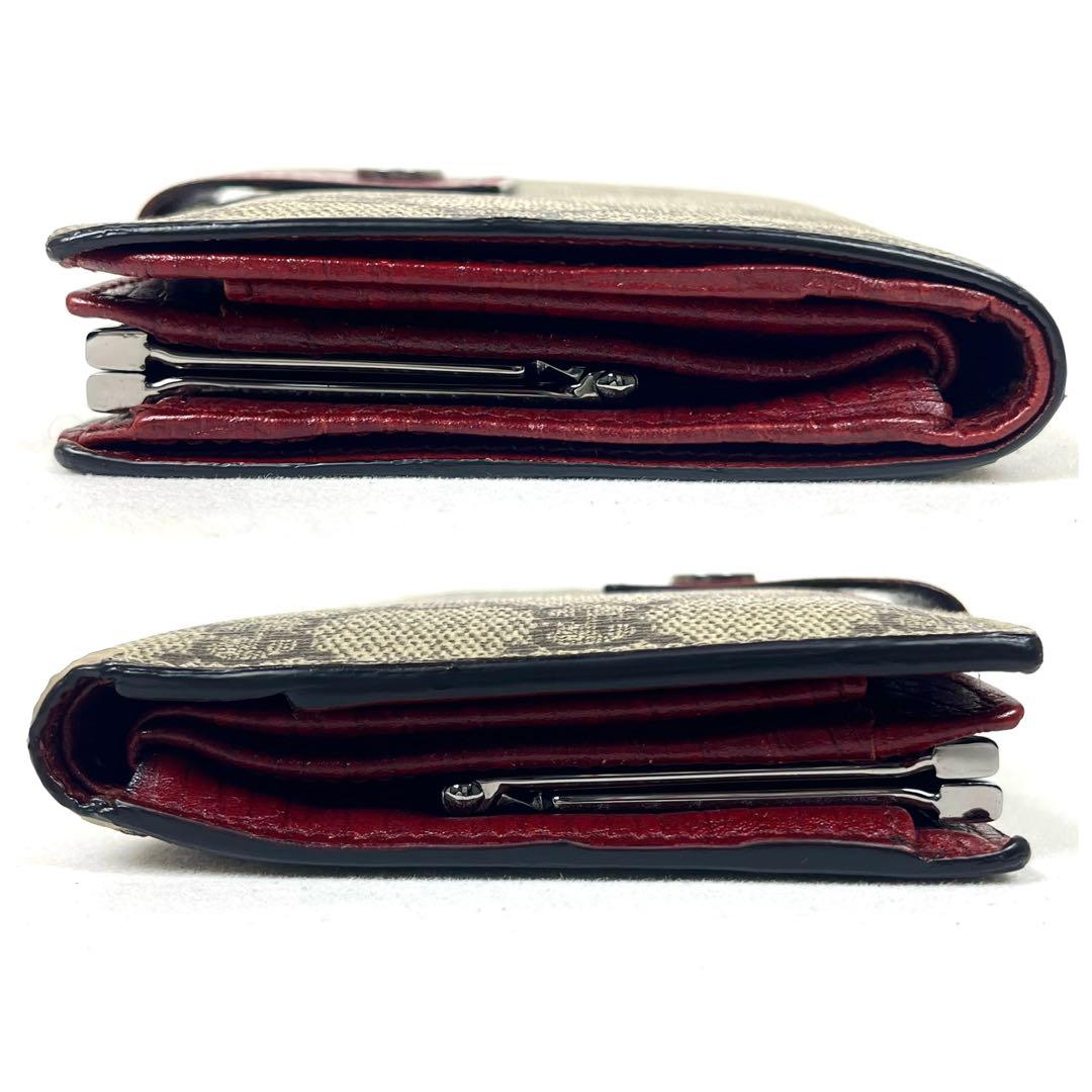 グッチ　折り財布　GGスプリーム　ロゴ総柄　がま口　ミディアム　PVC レザー