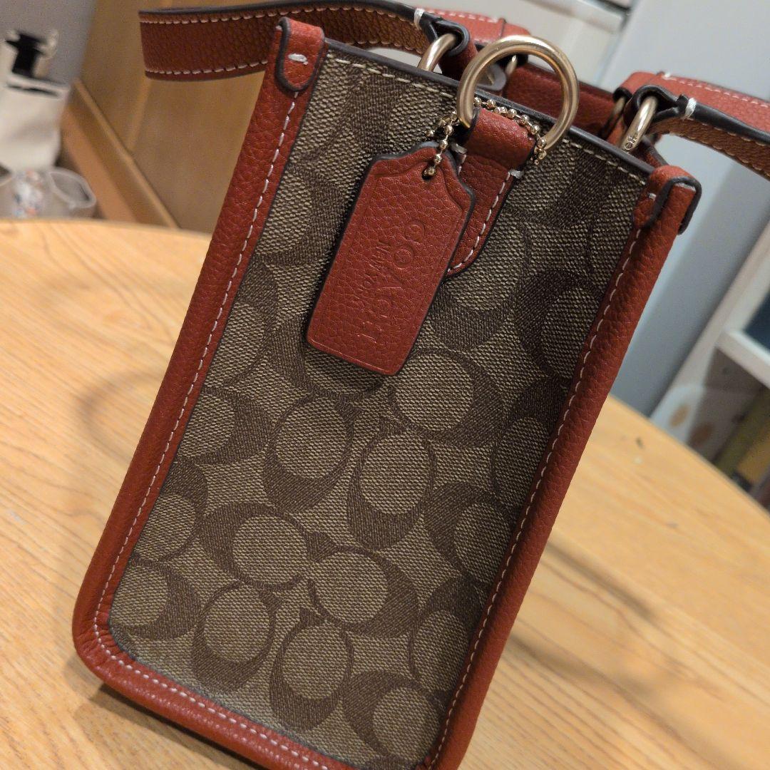 【美品】コーチスヌーピコラボデンプシートート22・シグネチャー キャンバスバッグ