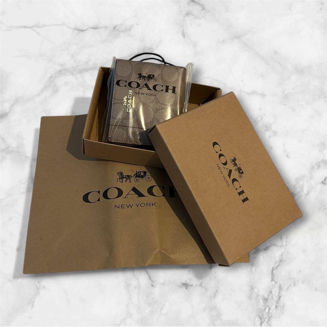 新品 COACH 二つ折財布 シグネチャー ラウンドファスナー ブラウン