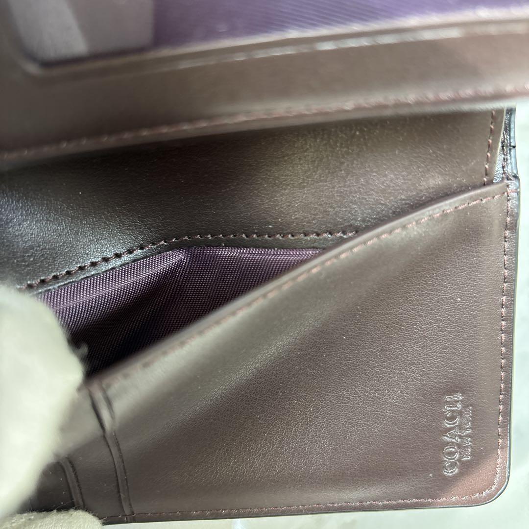 【美品】COACH コーチ 折り財布シグネチャーエンボス加工パテントレザー　黒