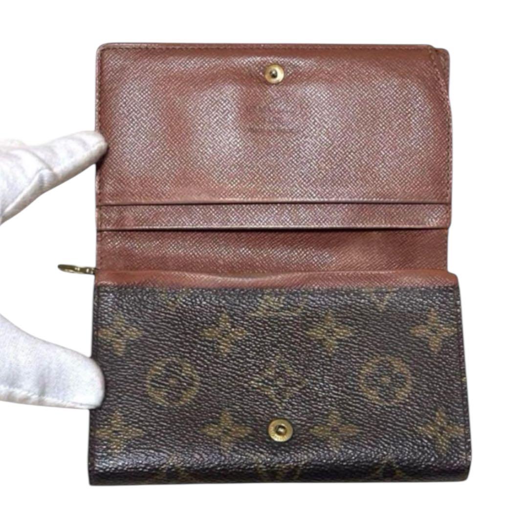 ルイヴィトン　折り財布　ポルトモネビエトレゾール　モノグラム　ブラウン　PVC