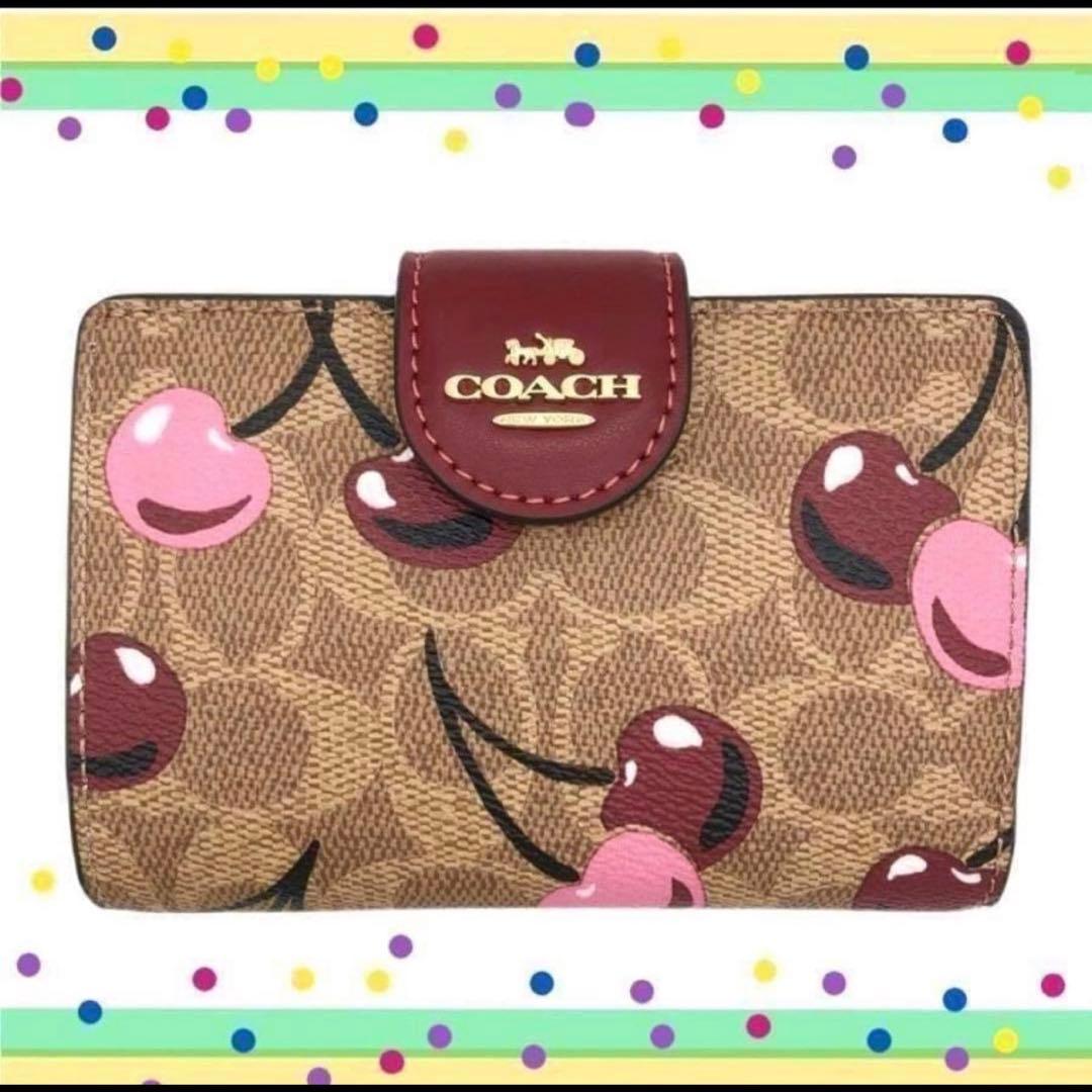 初売り　COACHコーチシグネチャー さくらんぼ柄ミディアム二つ折り財布