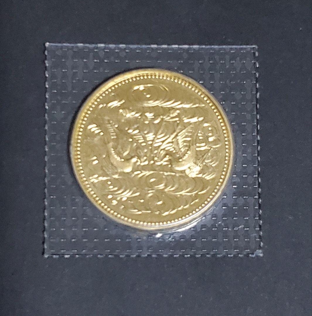 天皇陛下御在位60年記念10万円金貨幣