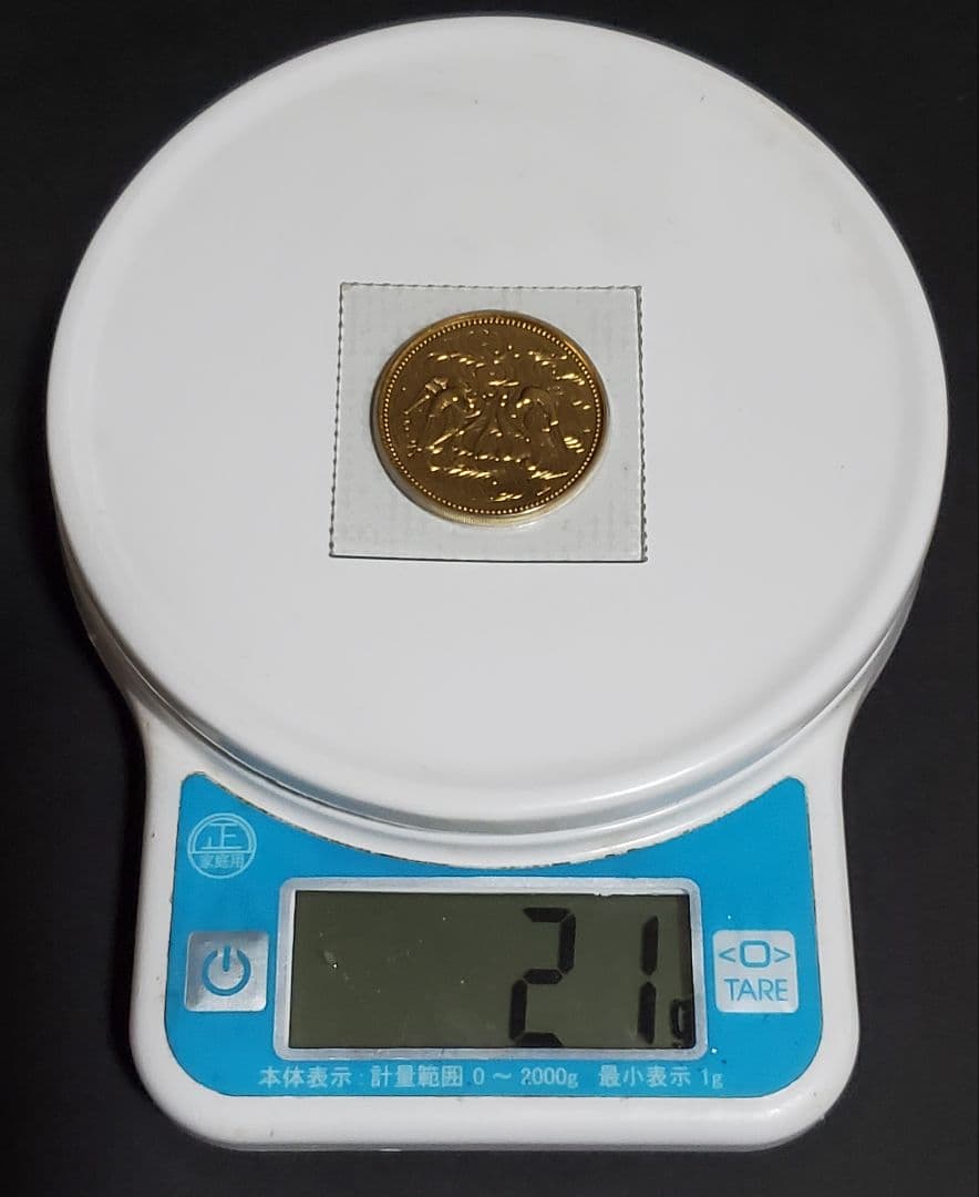 天皇陛下御在位60年記念10万円金貨幣