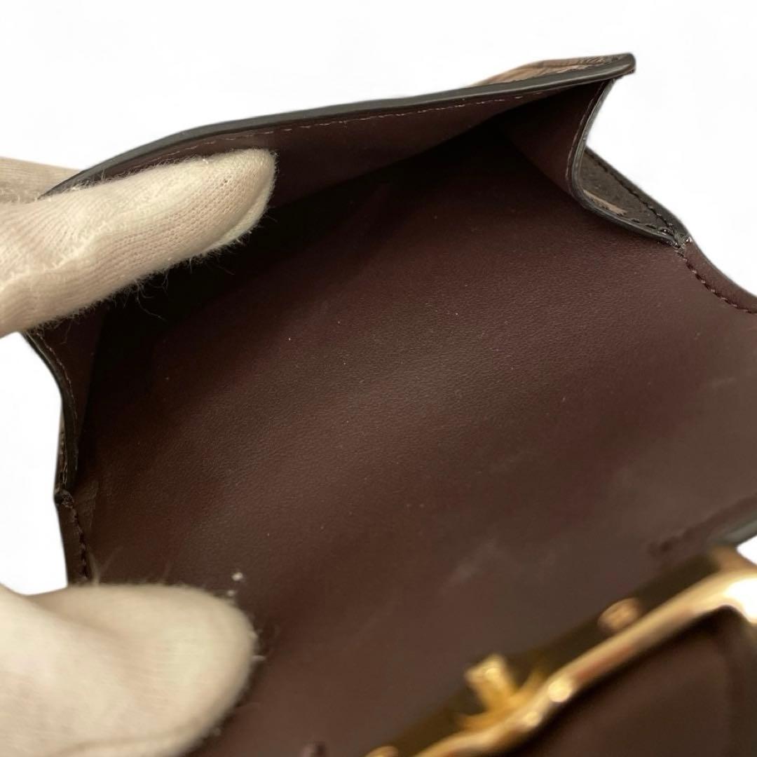 【未使用級】COACH 二つ折り財布 パテントレザー シグネチャー ブラック 黒