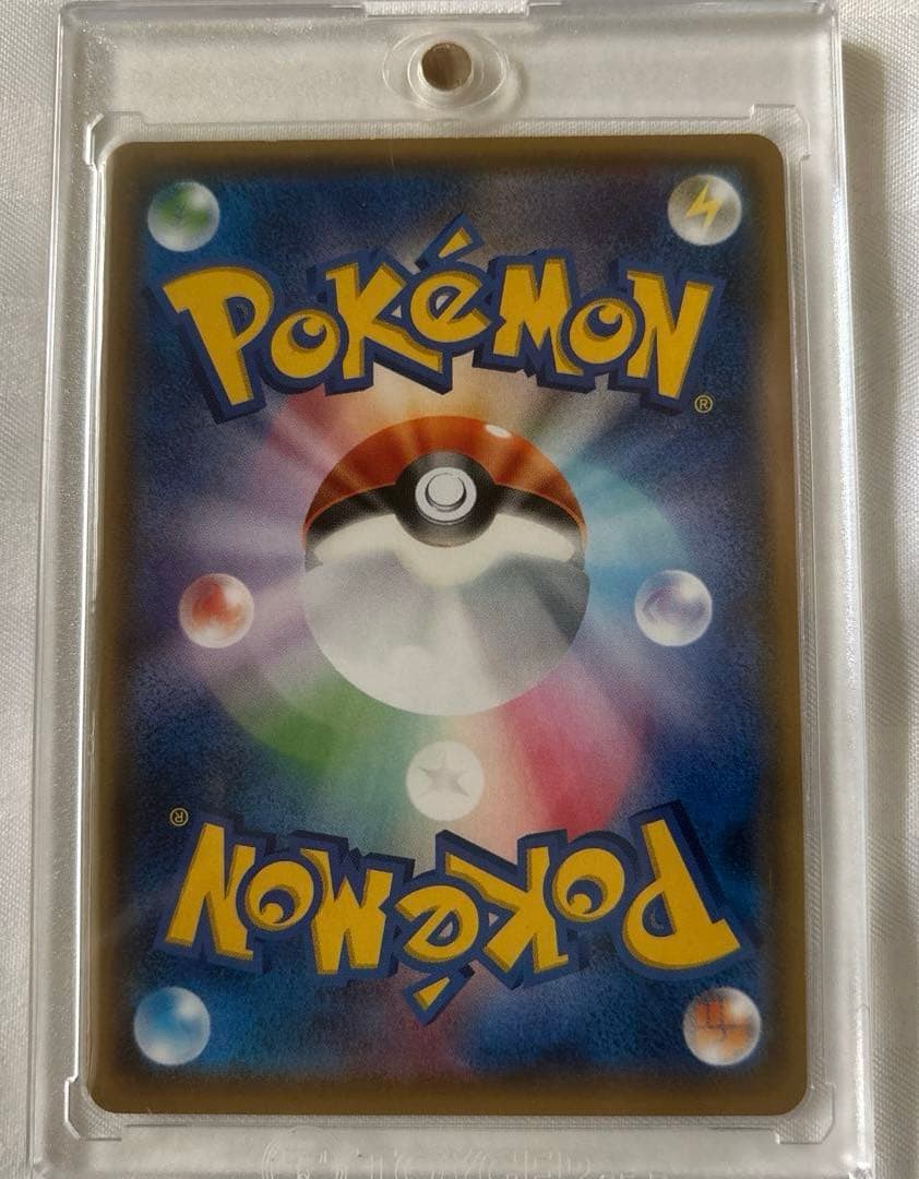 ポンチョを着たイーブイ ブラッキー プロモ 141/SM-P