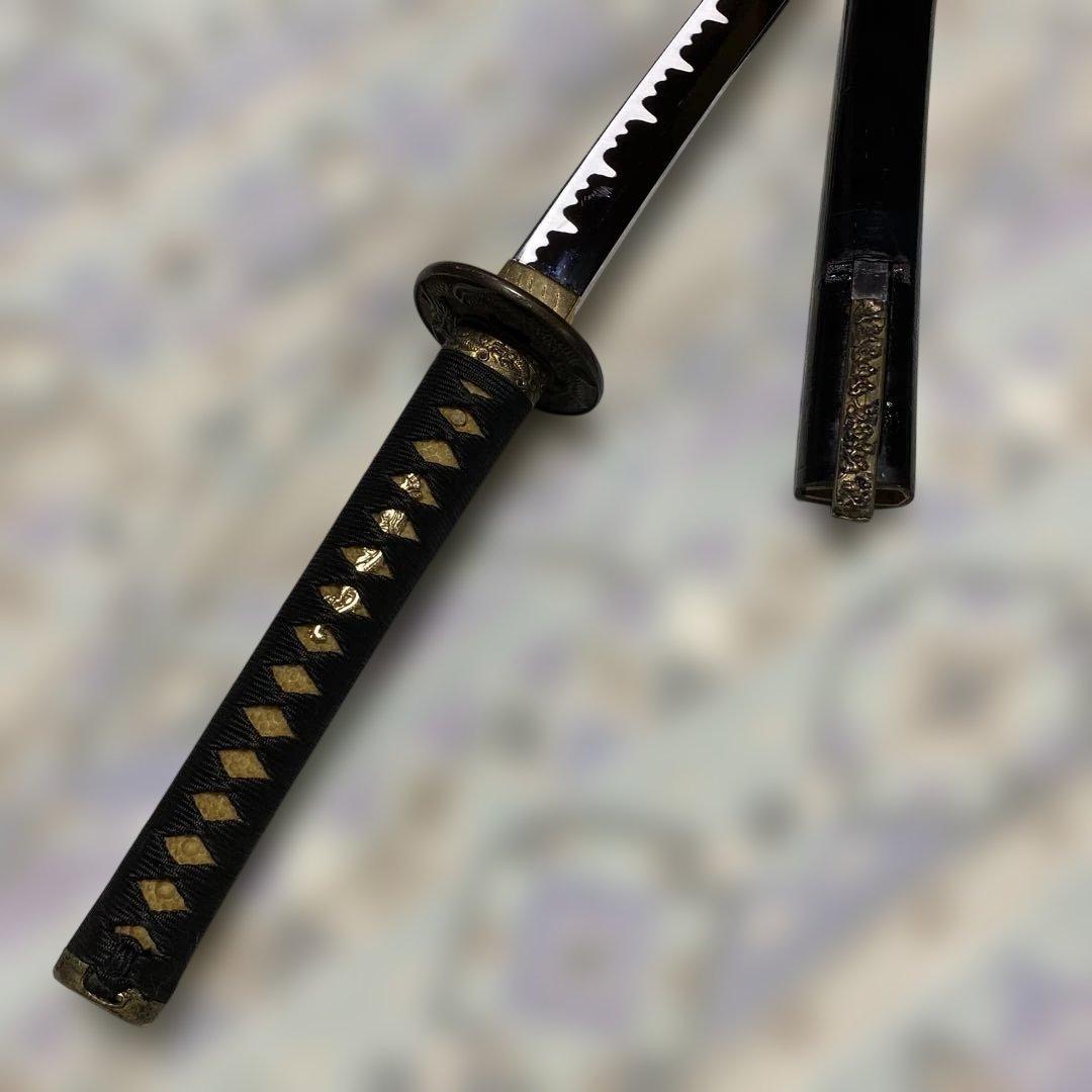 模造刀(小柄付) 黒柄 龍彫楕円鍔 黒呂鞘