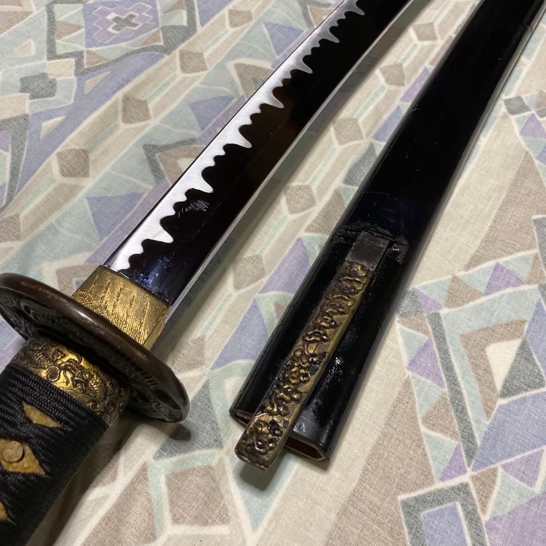 模造刀(小柄付) 黒柄 龍彫楕円鍔 黒呂鞘