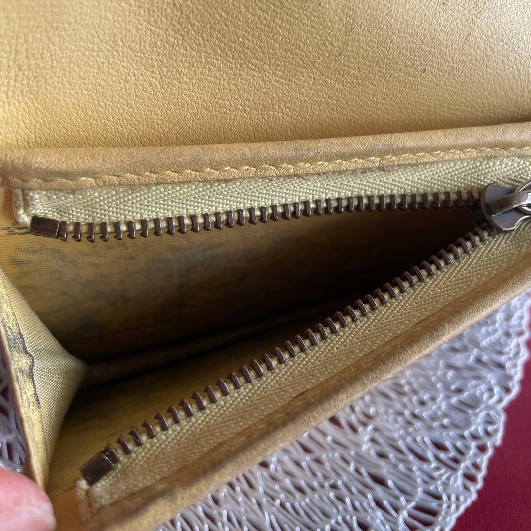 グッチ折財布　パイソンマーモントイエロー。箱付き