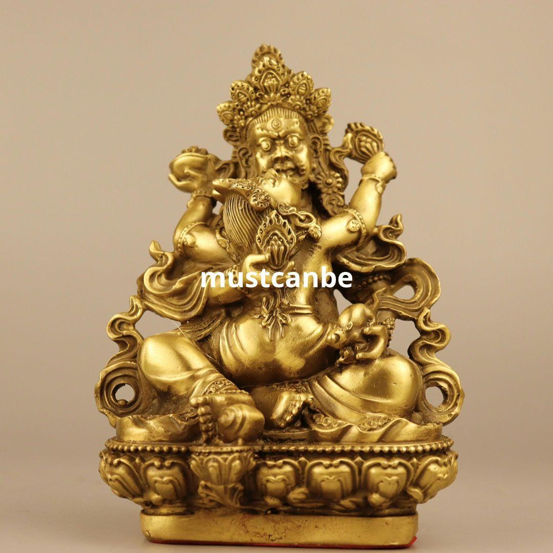 精緻な金属製仏像、金色の装飾、仏教文化の象徴。