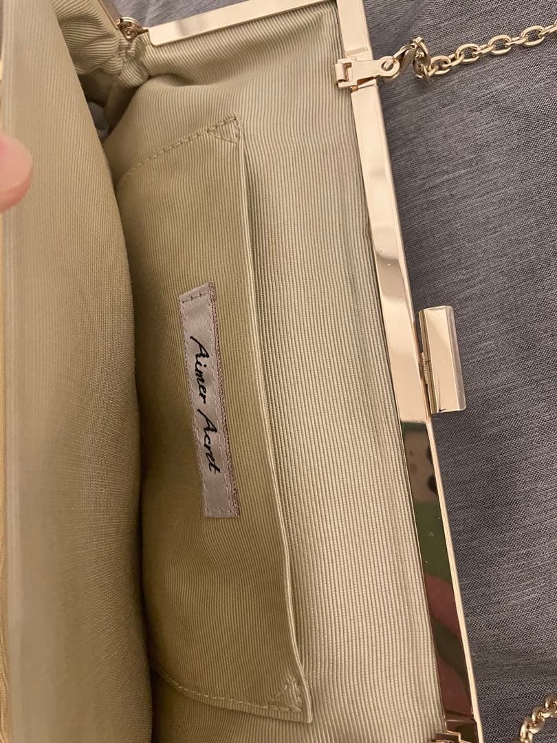 AIMER/エメ　フレアタッククラッチバッグ