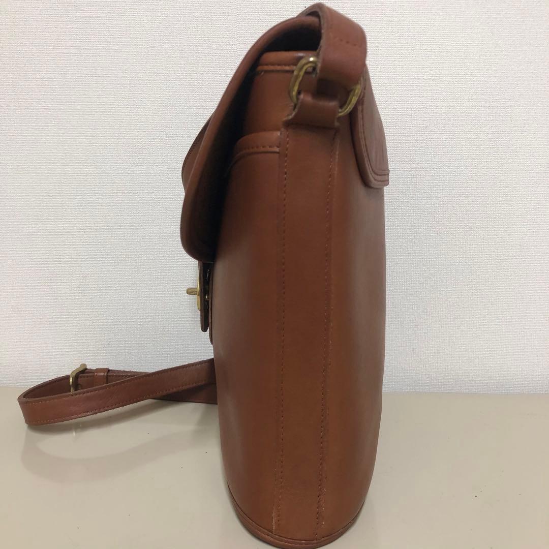 COACH ショルダーバッグ クロスボディ バケツ型 レザー 茶色　ターンロック