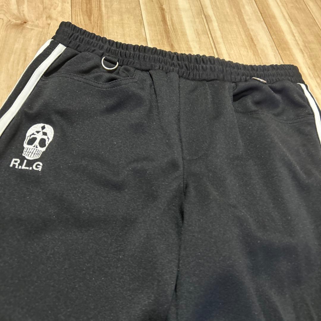 ラリー RALEIGHトラックスーツ cyberdyne RADIOTS 666