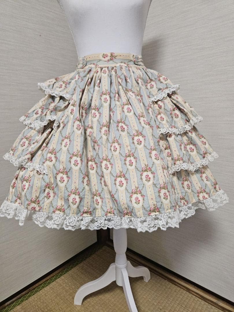 メタモルフォーゼ 初期 花柄サイドフリルスカート サックス