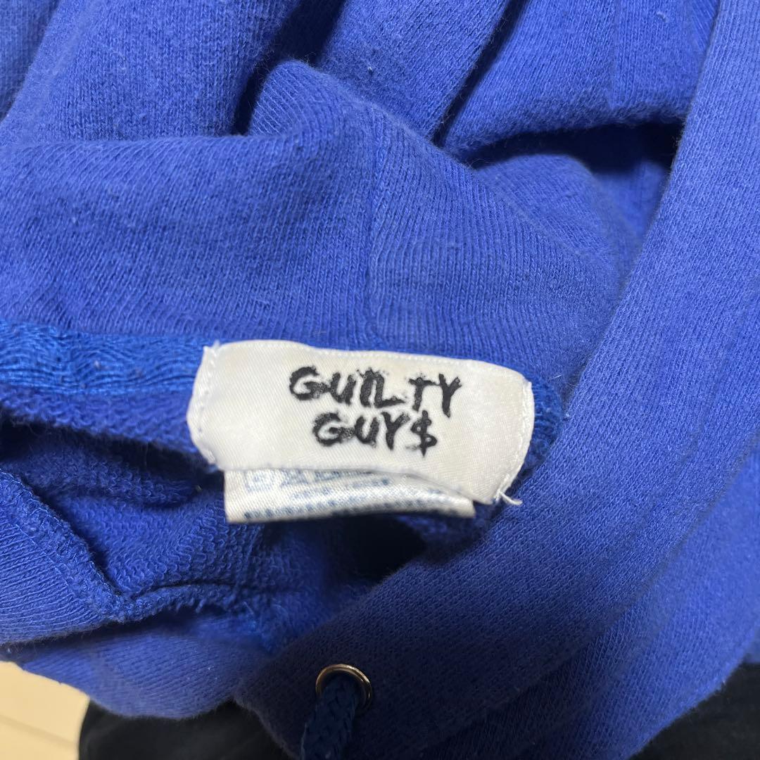 GUILTY GUYS 青 フーディー