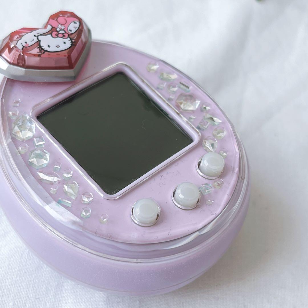 たまごっちピースTamagotchi P's パープル サンリオ たまデコピアス
