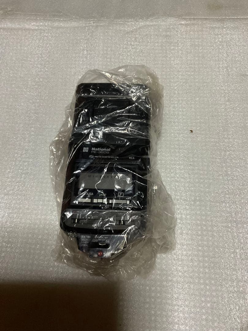 NIKOMAT・EL。一眼レフカメラ。ナショナルPE-32Sフラッシュ付き。