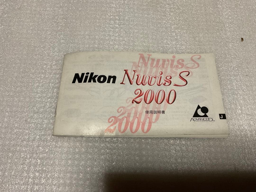 NIKOMAT・EL。一眼レフカメラ。ナショナルPE-32Sフラッシュ付き。