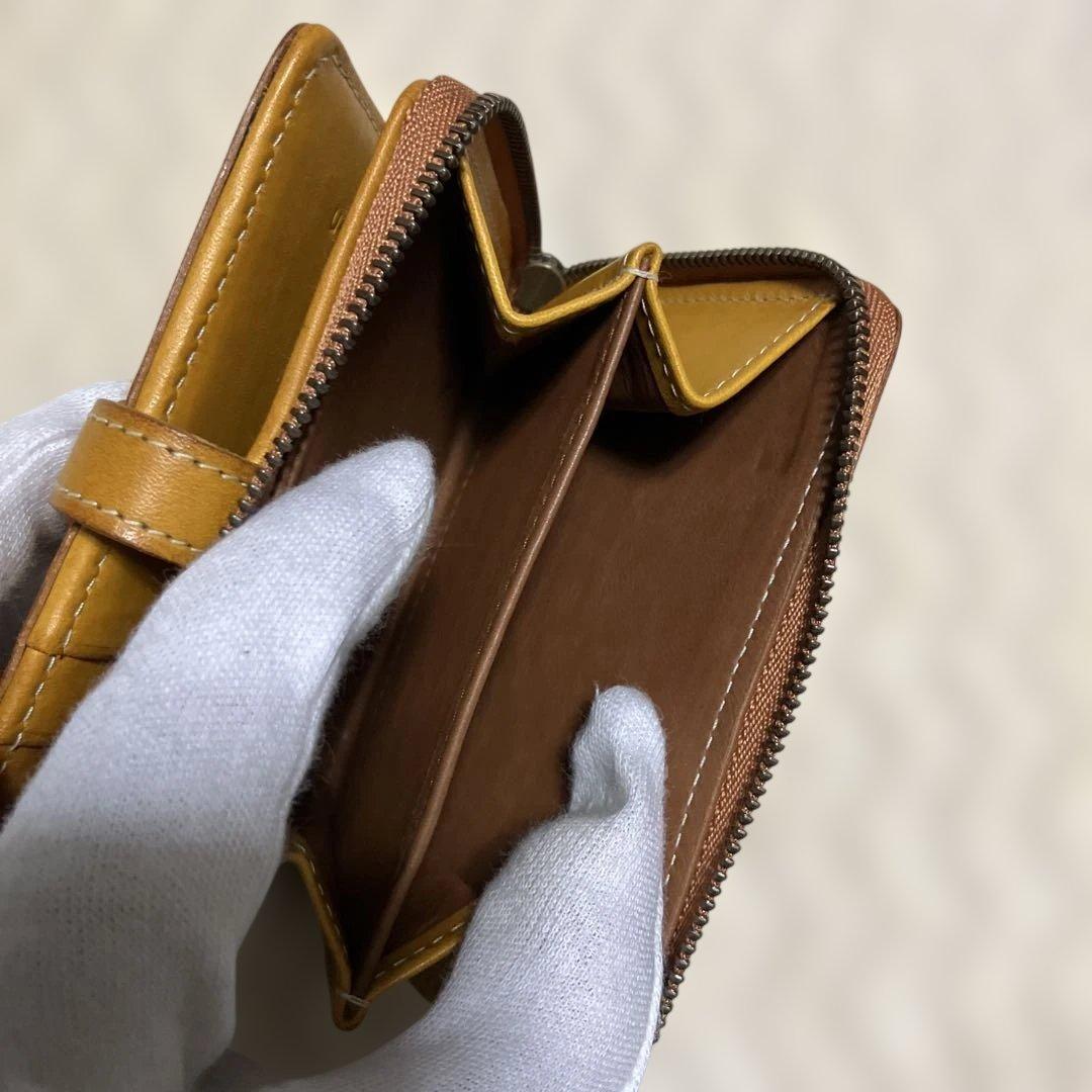 (美品) genten ゲンテン　カットワークレザー　二つ折り財布　オシャレ