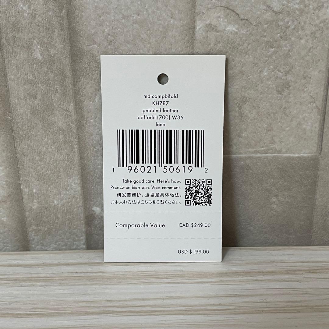 早い者勝ち！訳あり新品 kate spade 二つ折り財布 イエロー