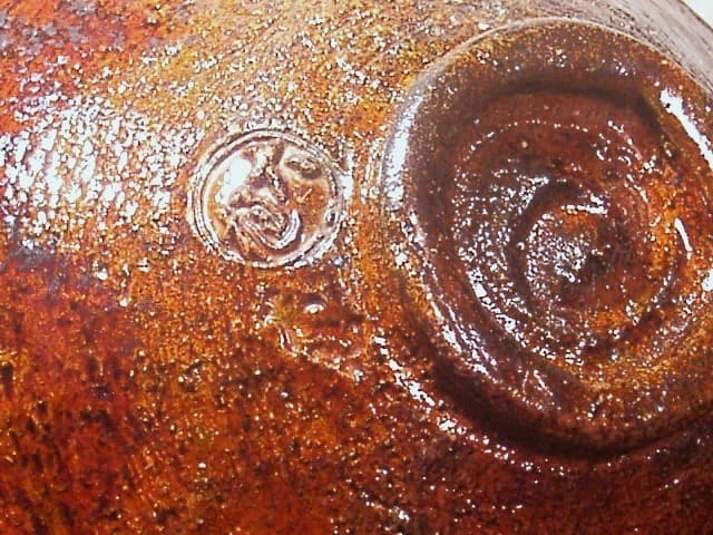 楽焼　大樋長楽作　飴釉　平茶碗　在銘　「大樋・長楽」無傷　共箱　古物。