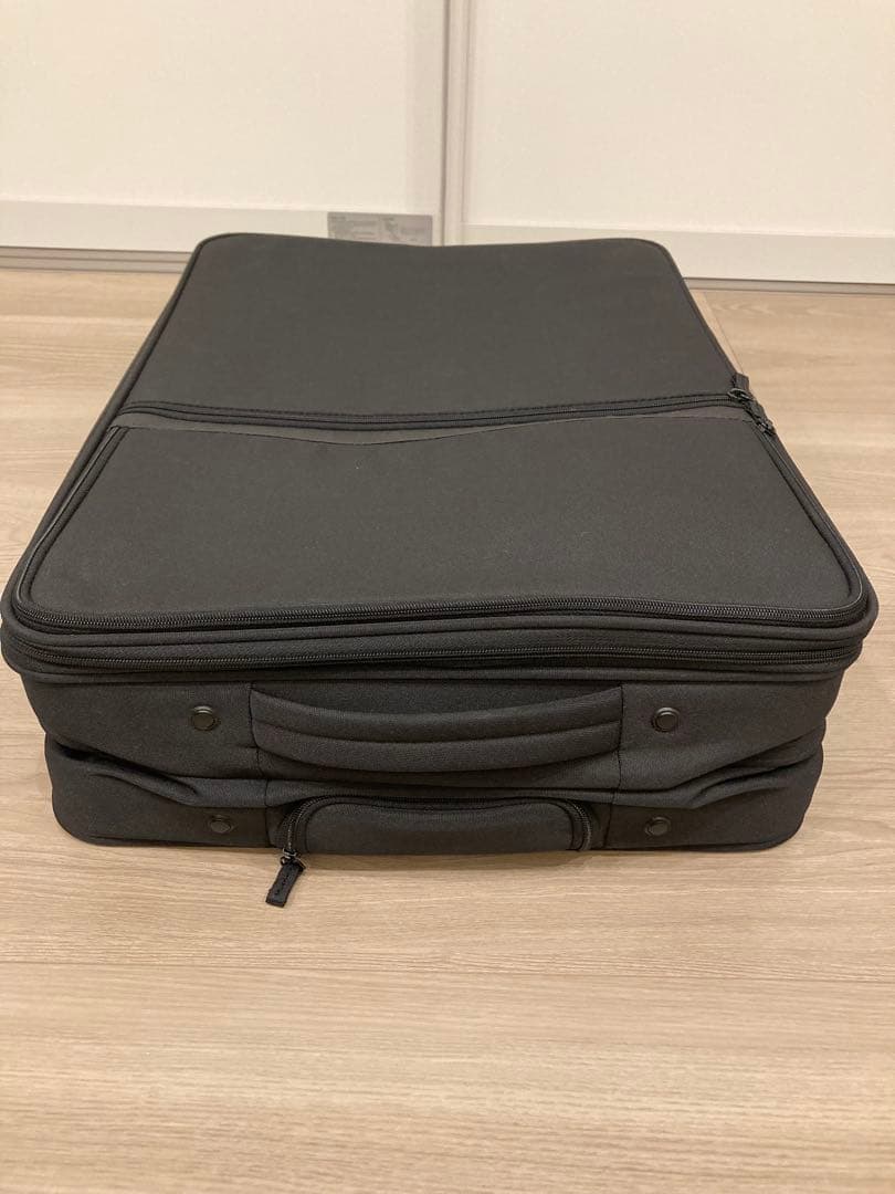 【無印良品】半分の厚みで収納できるソフトキャリーケース 63L ブラック