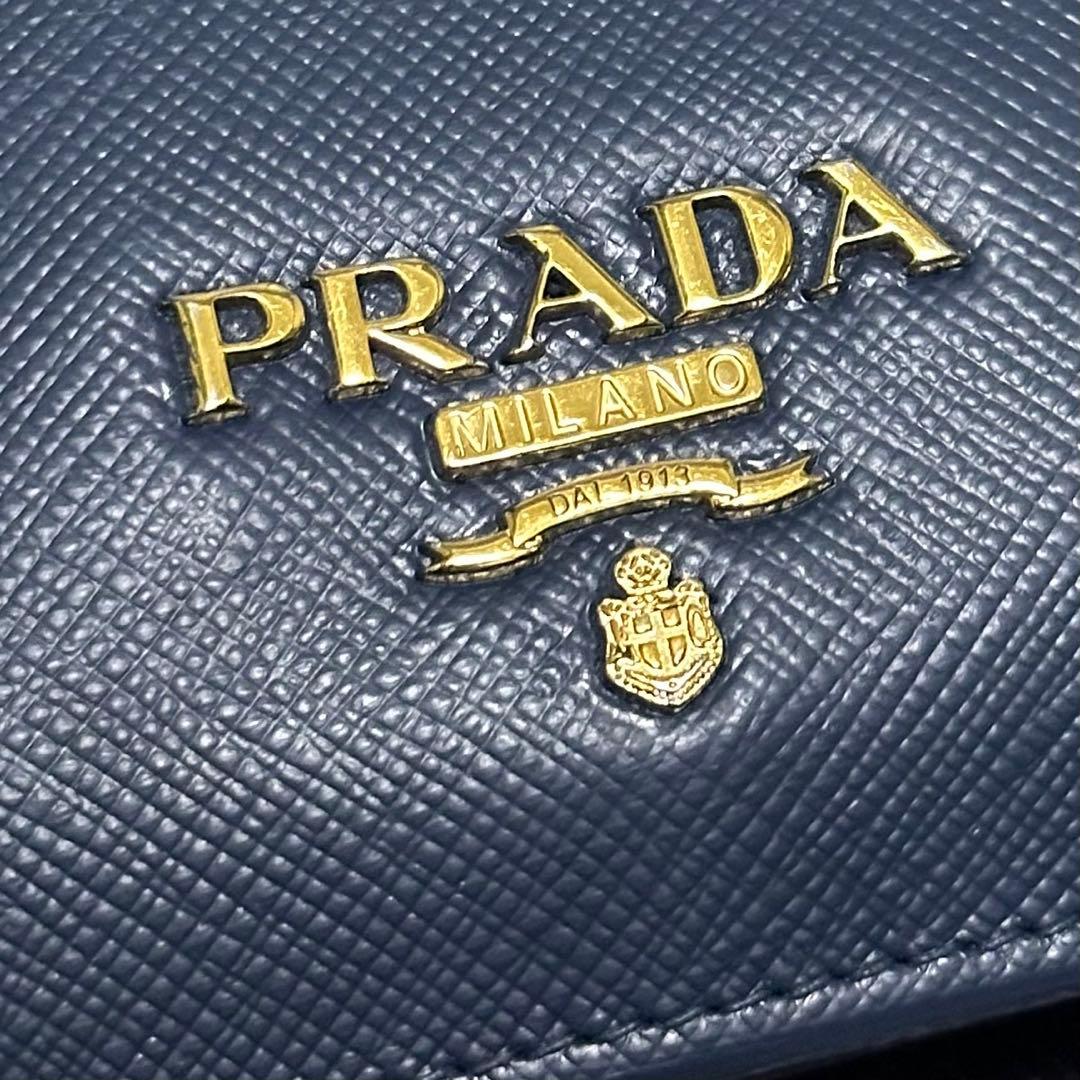 PRADA プラダ　折り財布　ゴールドロゴ　ブルー　サフィアーノレザー