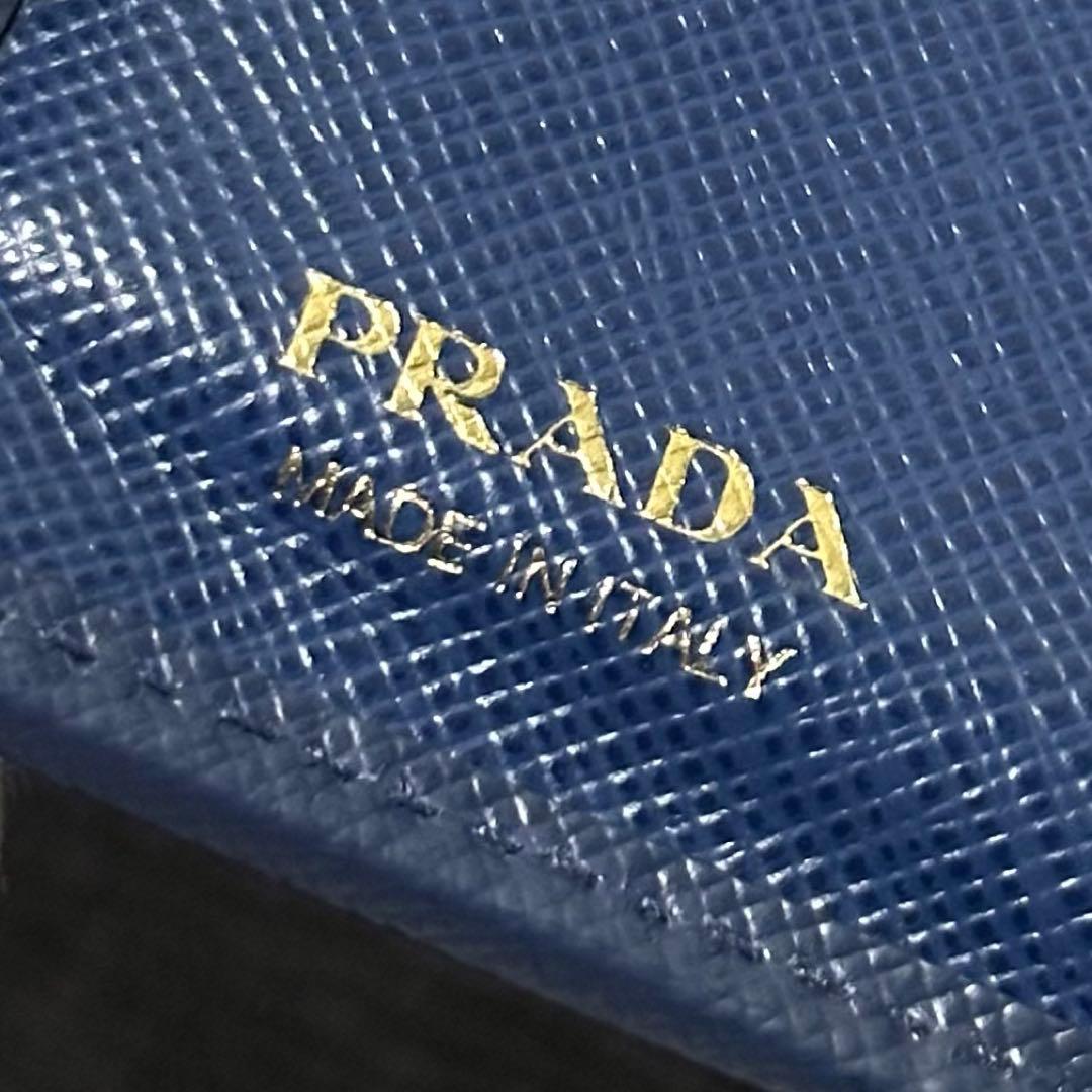 PRADA プラダ　折り財布　ゴールドロゴ　ブルー　サフィアーノレザー