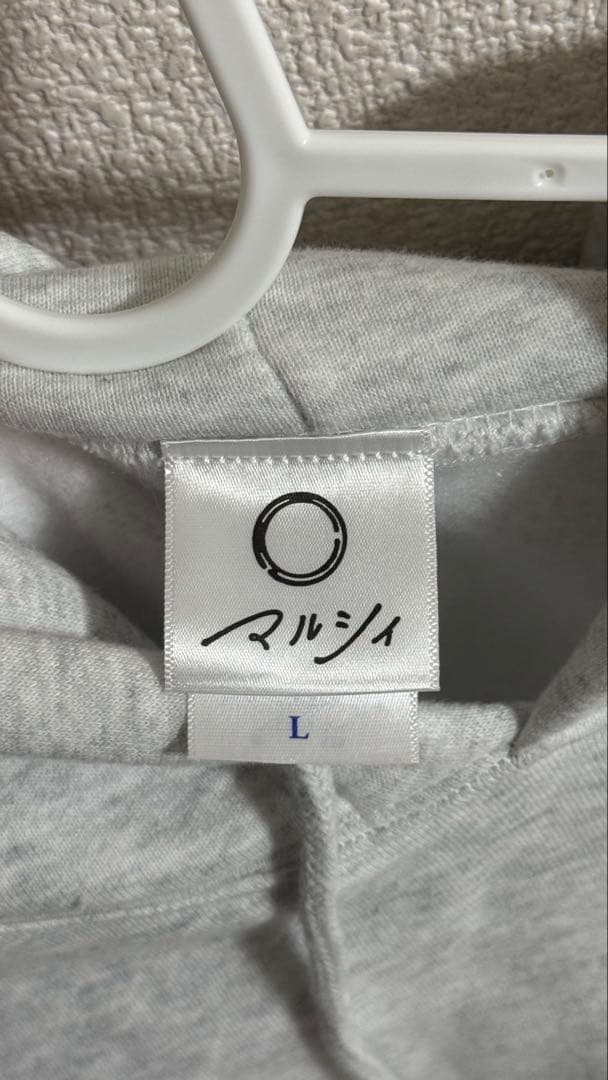 マルシィ　ニット風ロゴパーカー