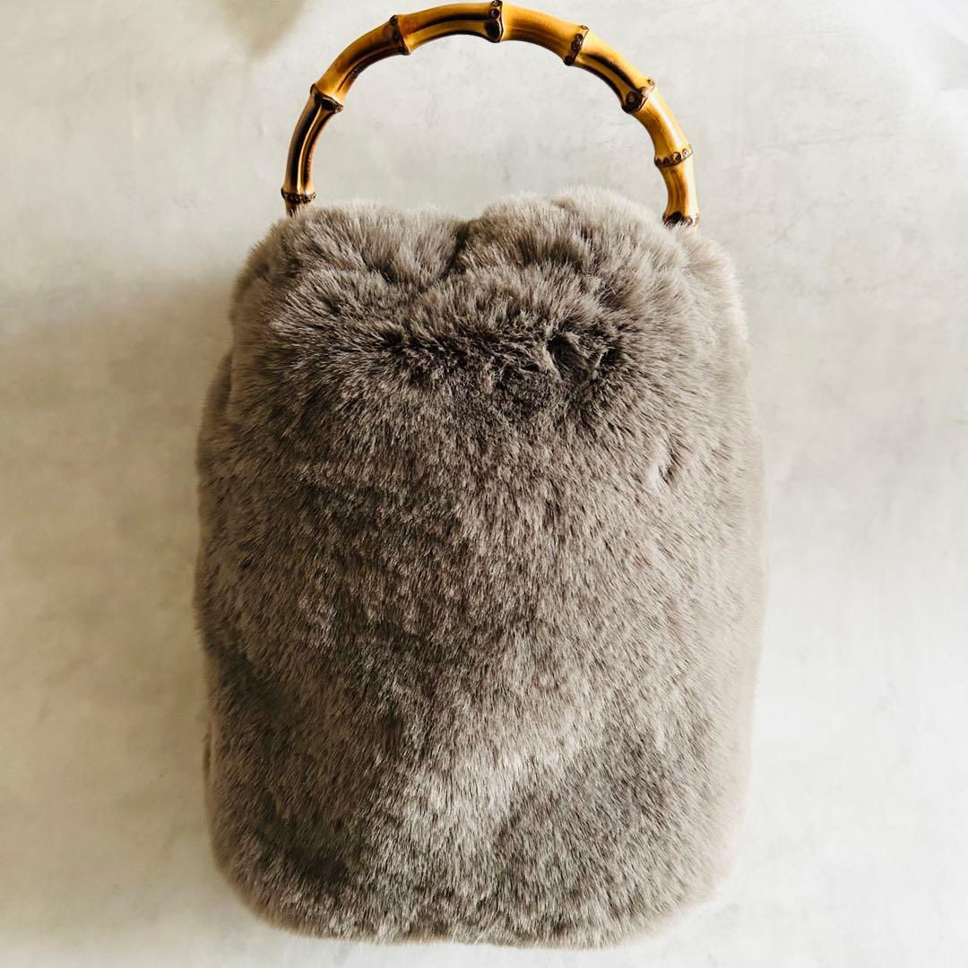 美品ヴィオラドーロファーバンブーハンドル巾着バック秋冬