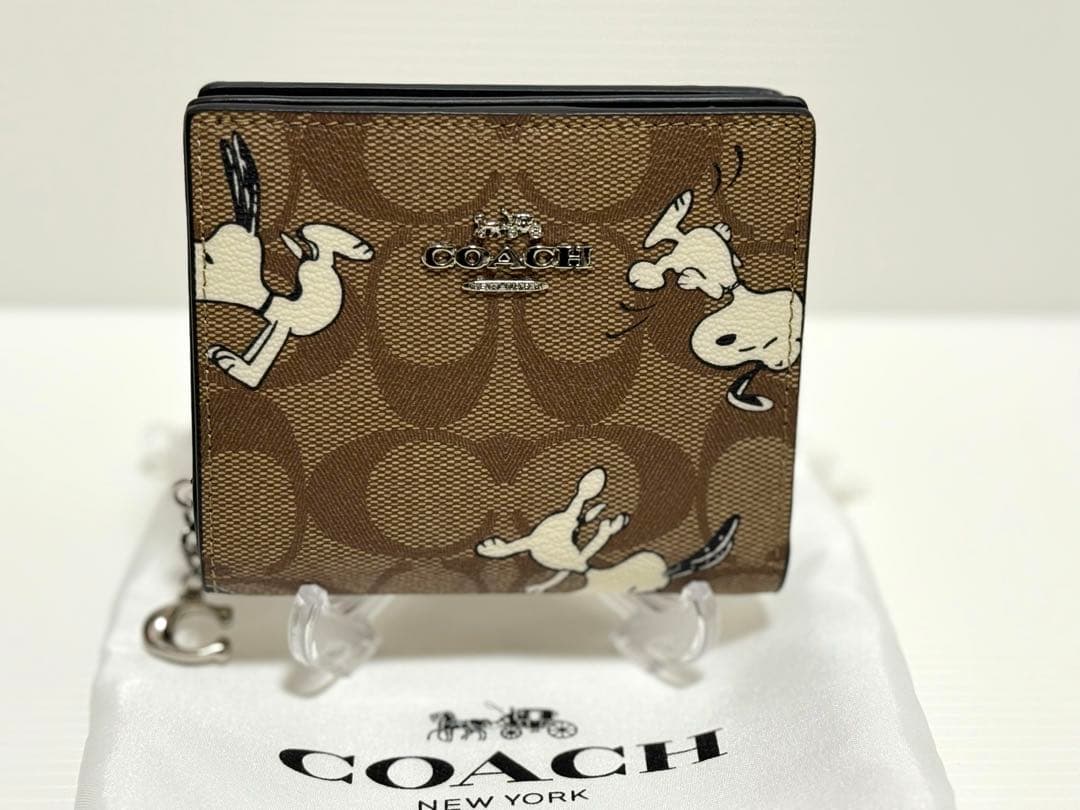 COACH × PEANUTS（スヌーピー）二つ折り財布 型番：C4591