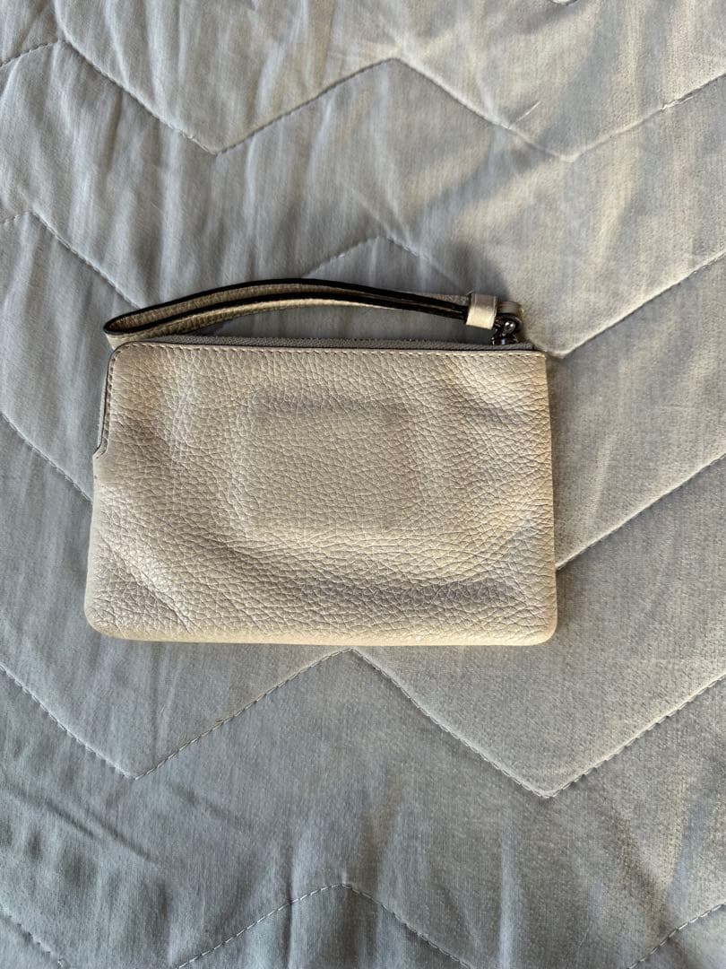 COACH ポーチリストレットダンボディズニー