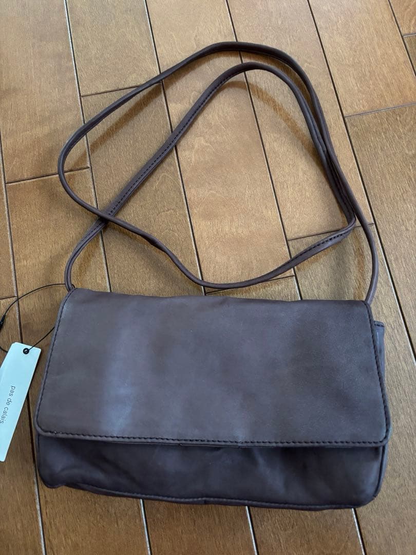 パドカレ　ハンドムラ染めレザーポーチバッグ