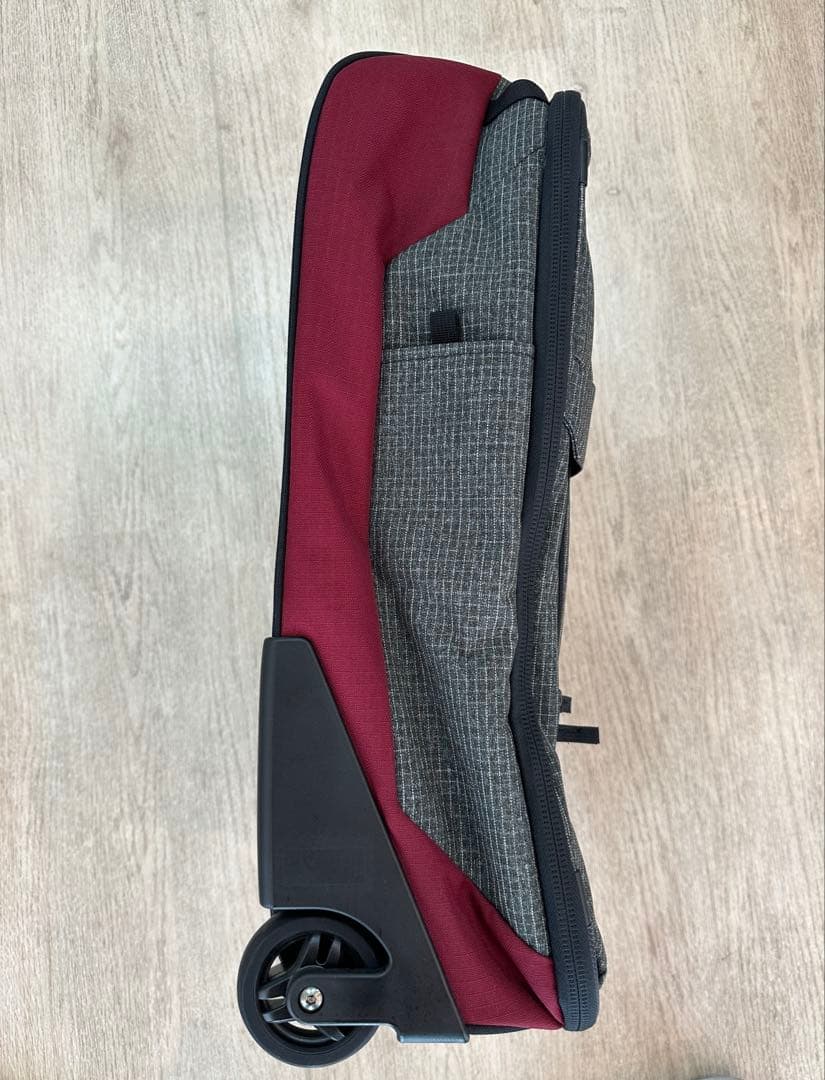 Dakine チェック柄キャリーケース 中型