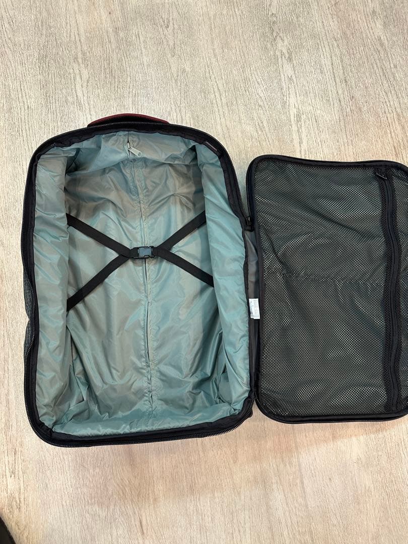 Dakine チェック柄キャリーケース 中型