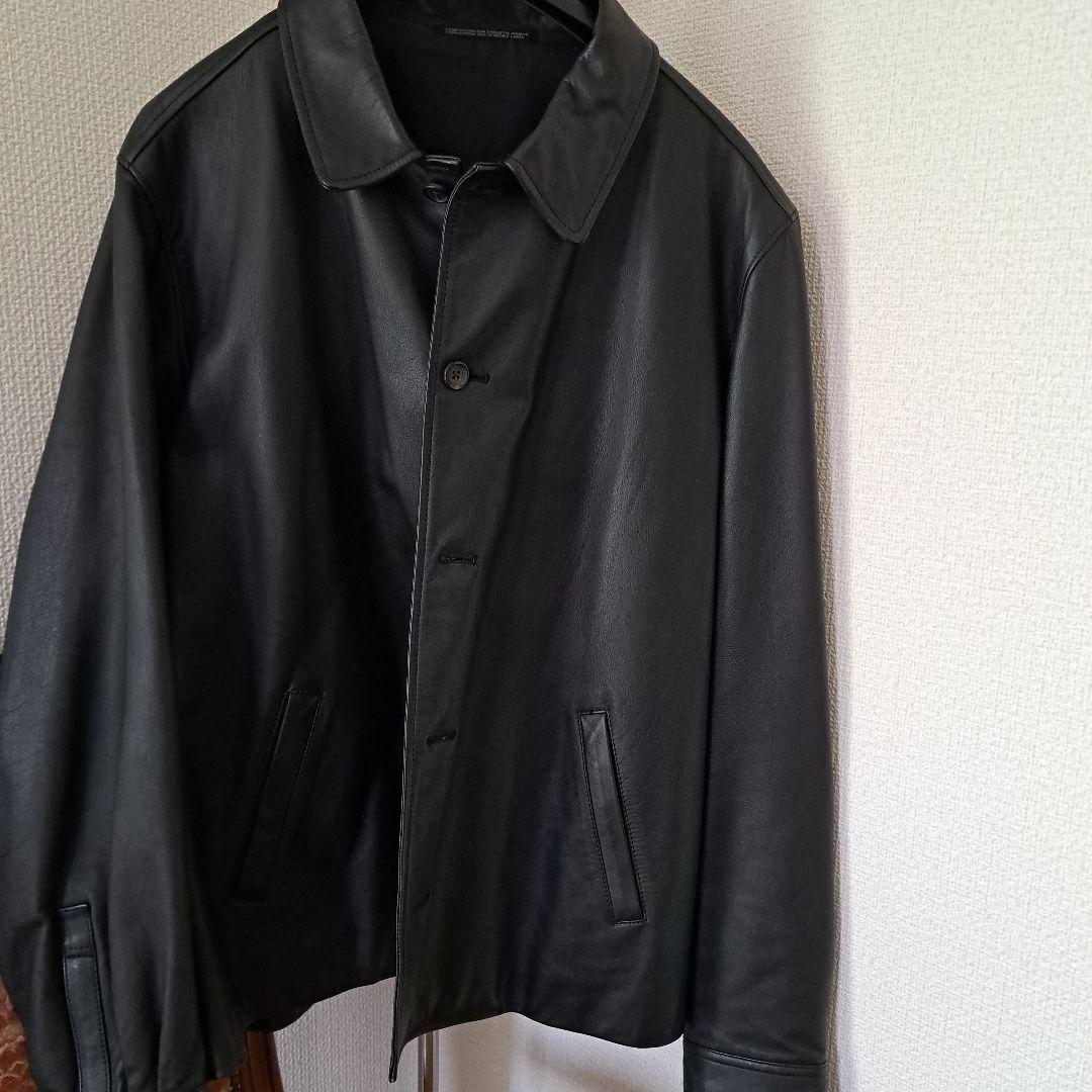 黒レザージャケット ボタン留め 襟付き