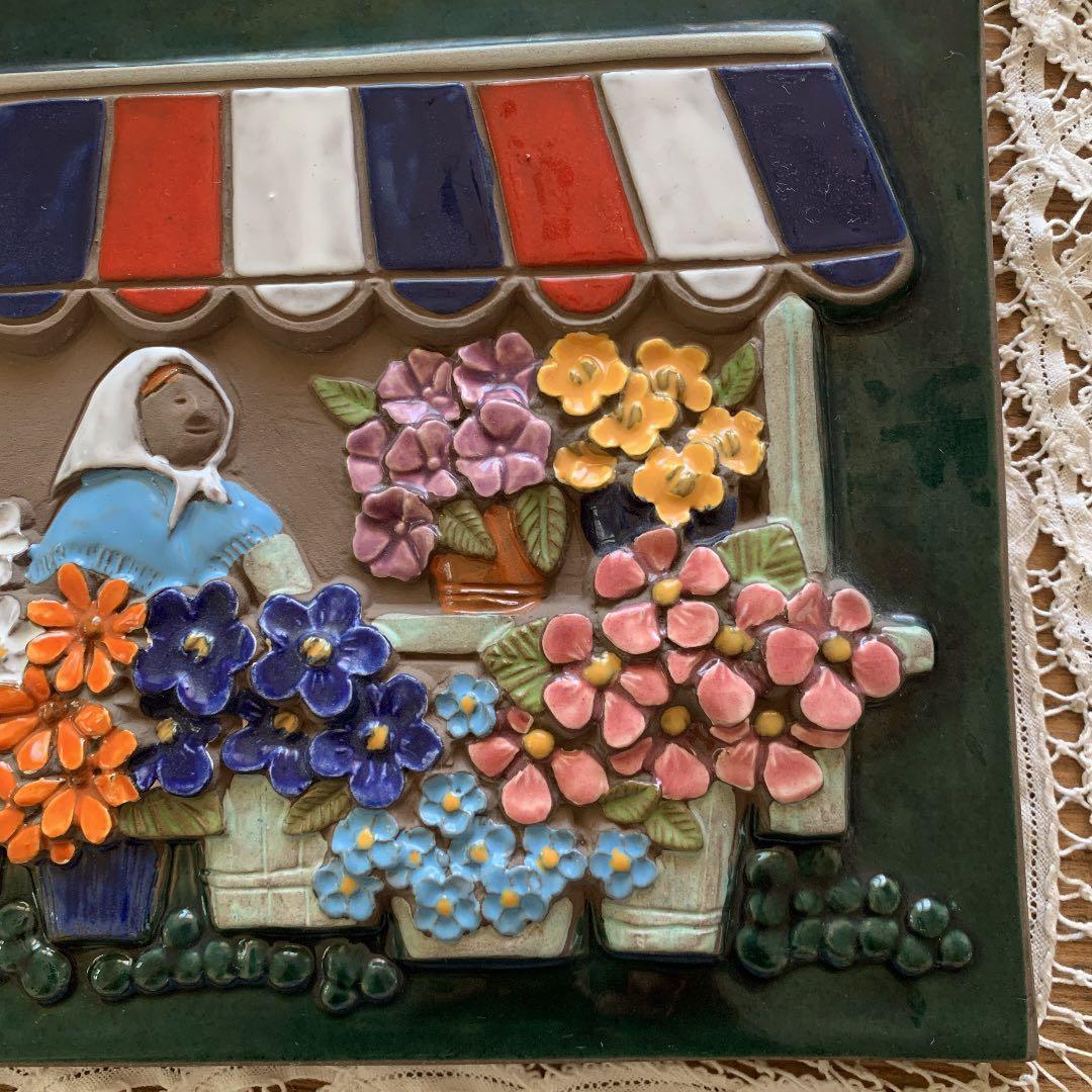 Jie Gantoftaジィガントフタ　陶板　広場のお花屋さん