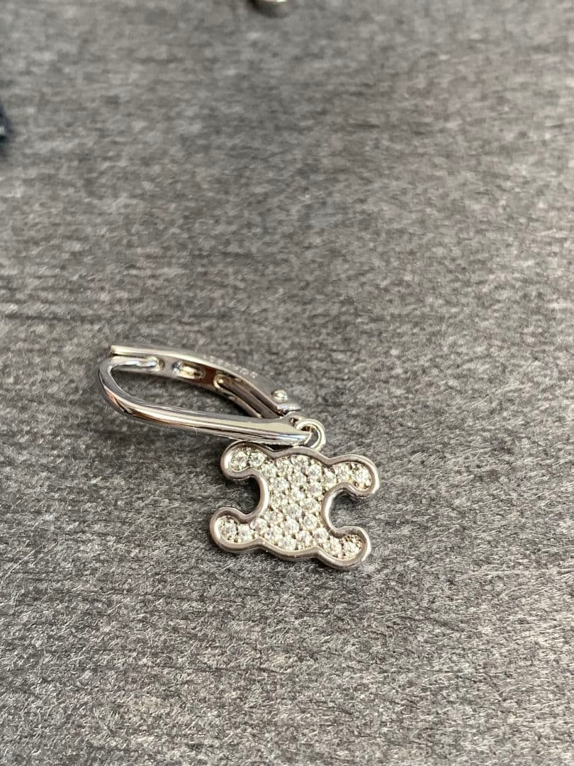 シルバー トリオンフ ラインストーン ピアス