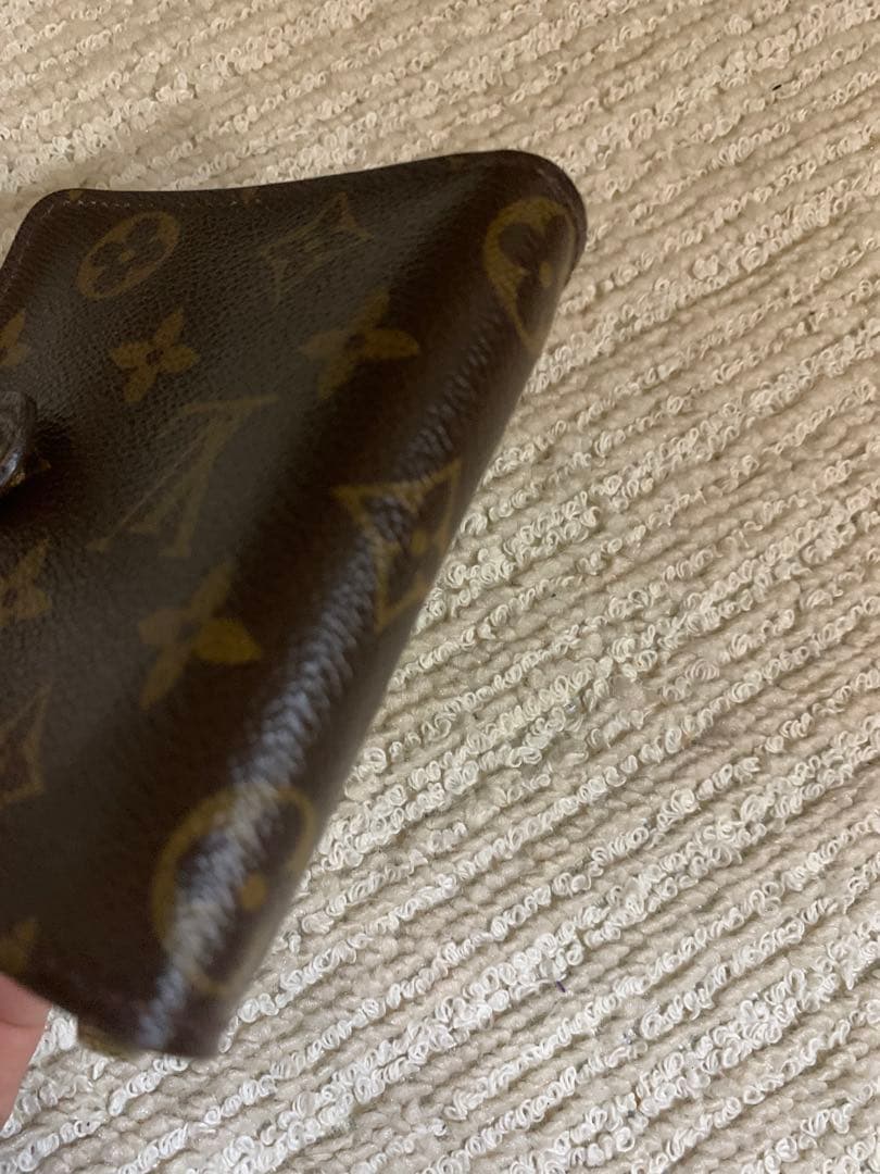 ルイ・ヴィトン 二つ折り財布 ダークブラウン。LOUIS VUITTON 。