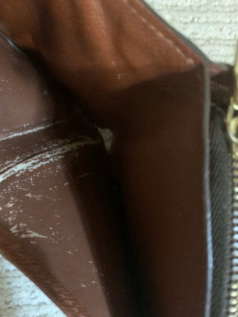 ルイ・ヴィトン 二つ折り財布 ダークブラウン。LOUIS VUITTON 。