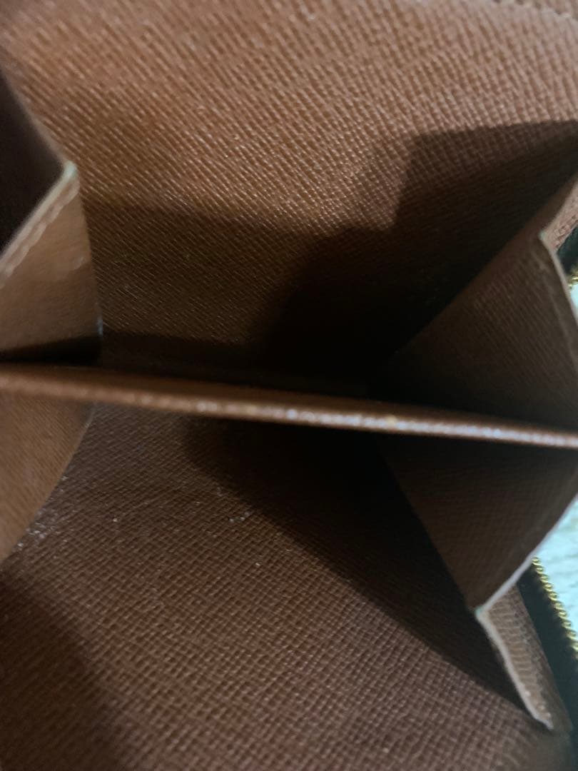 ルイ・ヴィトン 二つ折り財布 ダークブラウン。LOUIS VUITTON 。