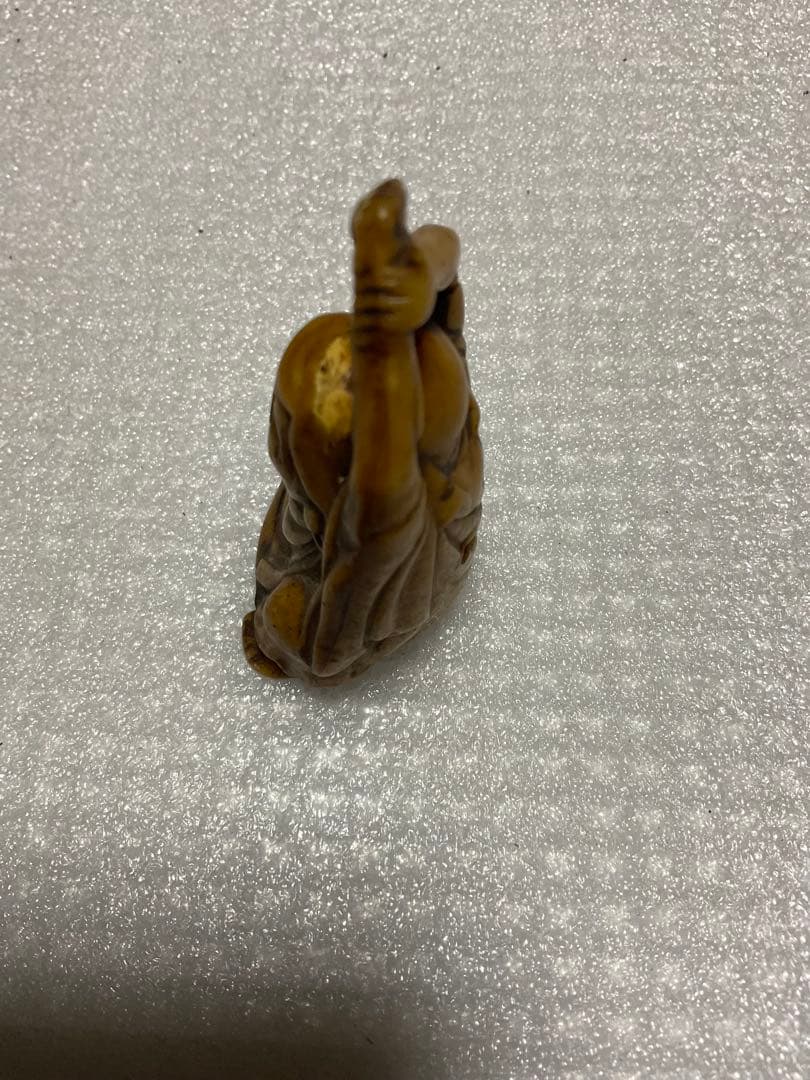 布袋様の根付／作者、年代は不明となっています？。